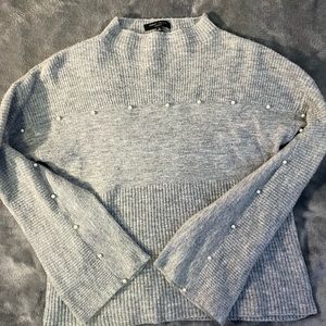 Grey sweater with pearls and bell sleeves